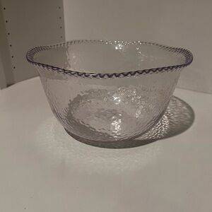 Textured clear plastic large salad bowl bowl.